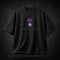 Black t-shirt with a cartoon character and 'Brick City' text on a dark background