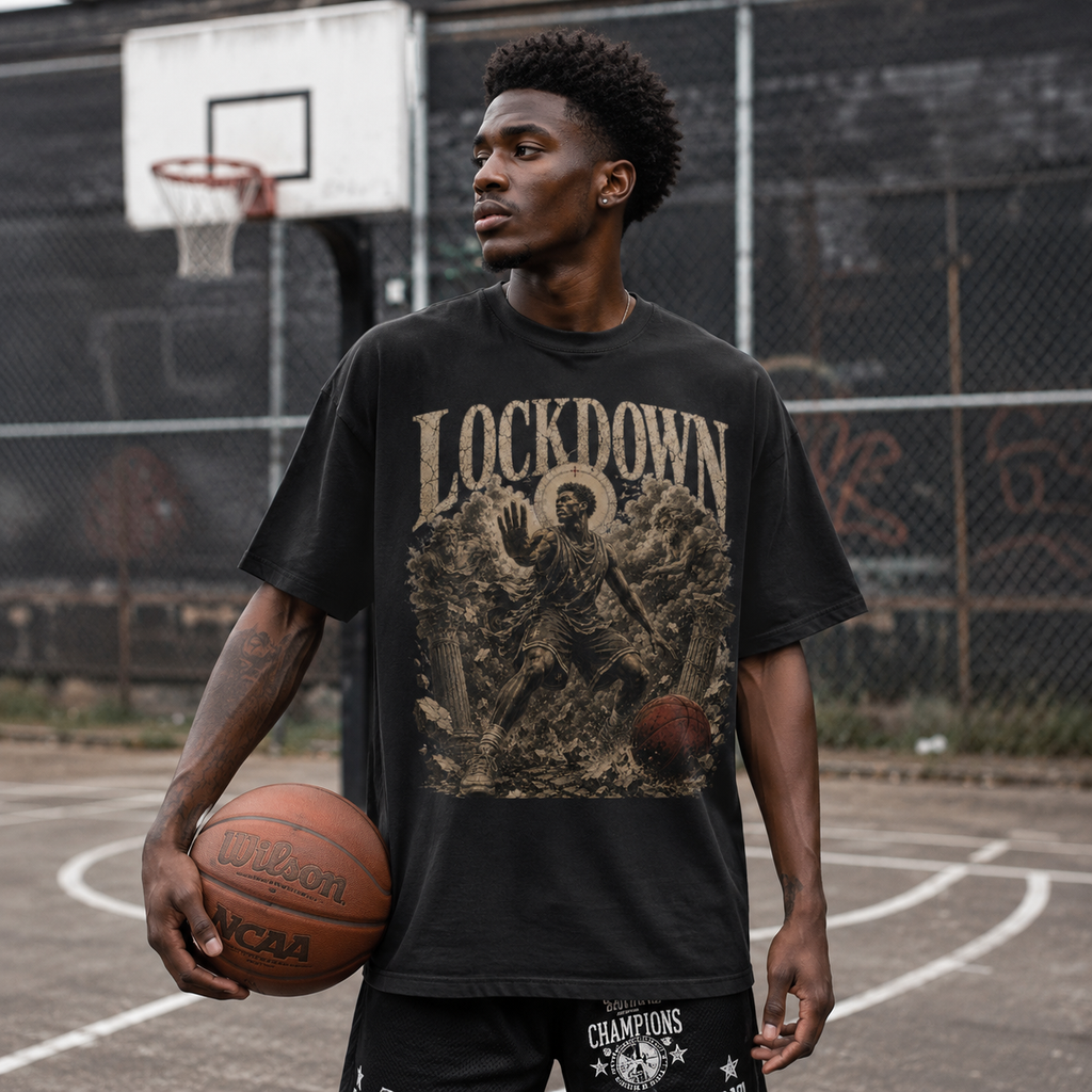 Person wearing a 'Lockdown' t-shirt holding a basketball on a court