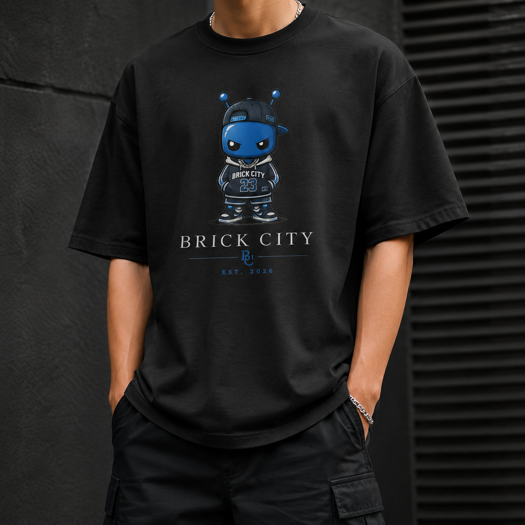 Person wearing a black t-shirt with a graphic design and text on a dark background