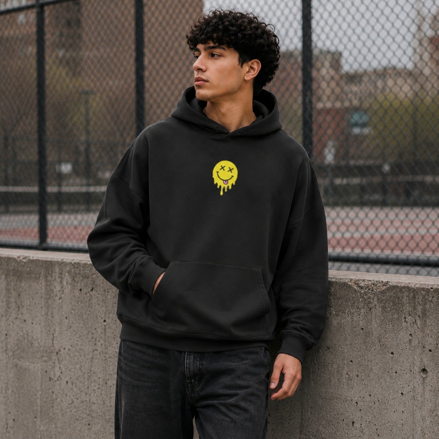 About to Cook Oversized Hoodie black front print fence lifestyle