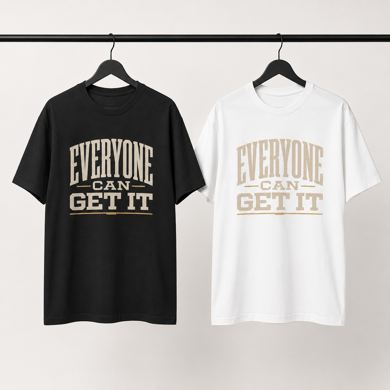 Everyone Can Get It T-Shirt in black and white on a studio clothing rail