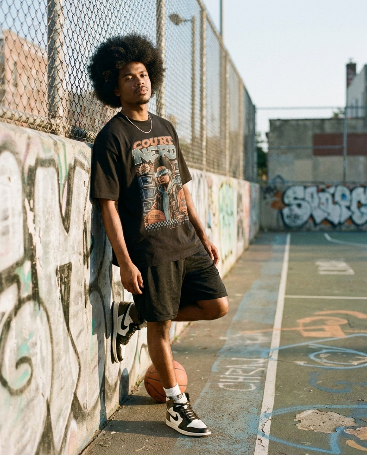 Hoop Nerd Tee outdoor basketball court lifestyle photo