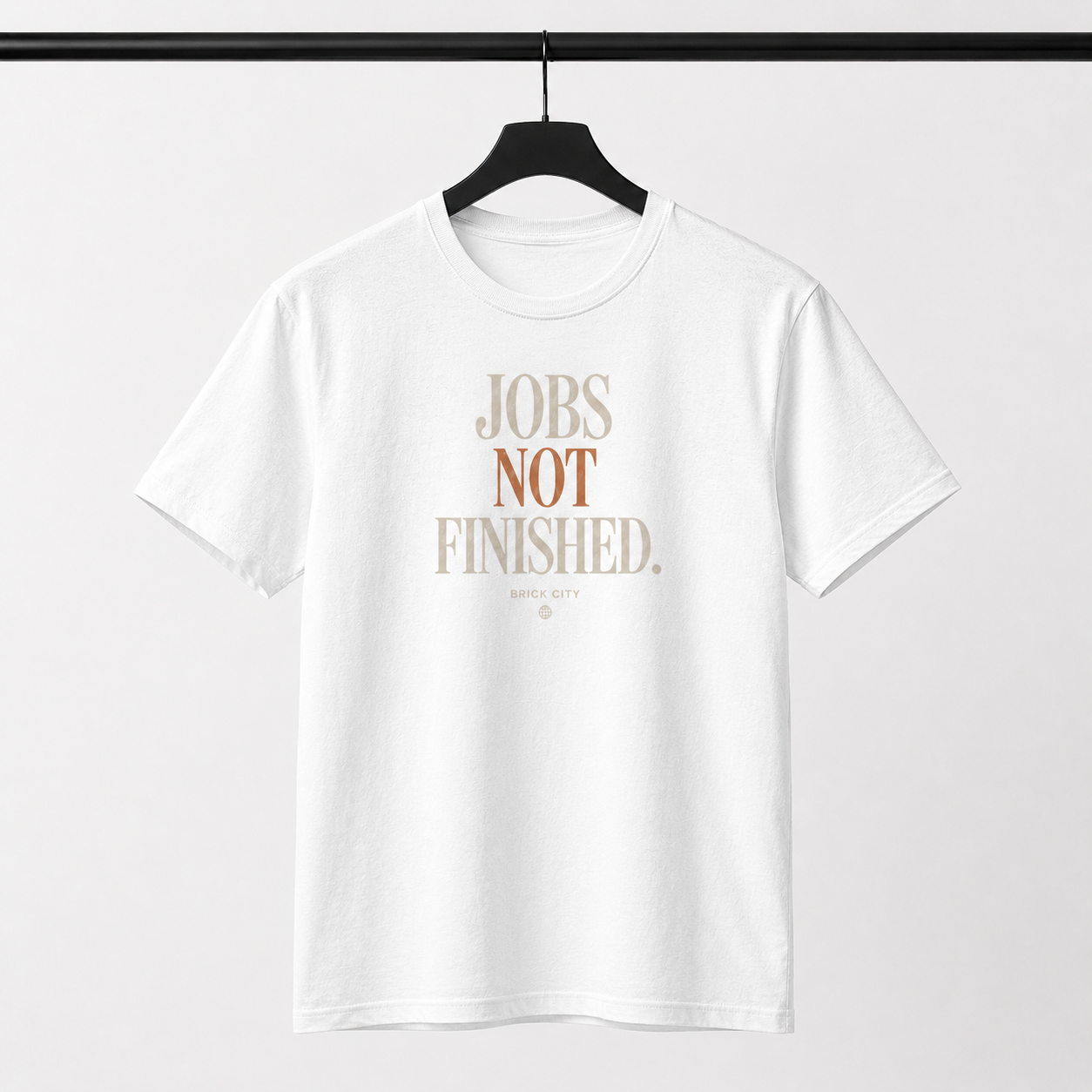 Jobs Not Finished T-Shirt on Brick City model in studio view one