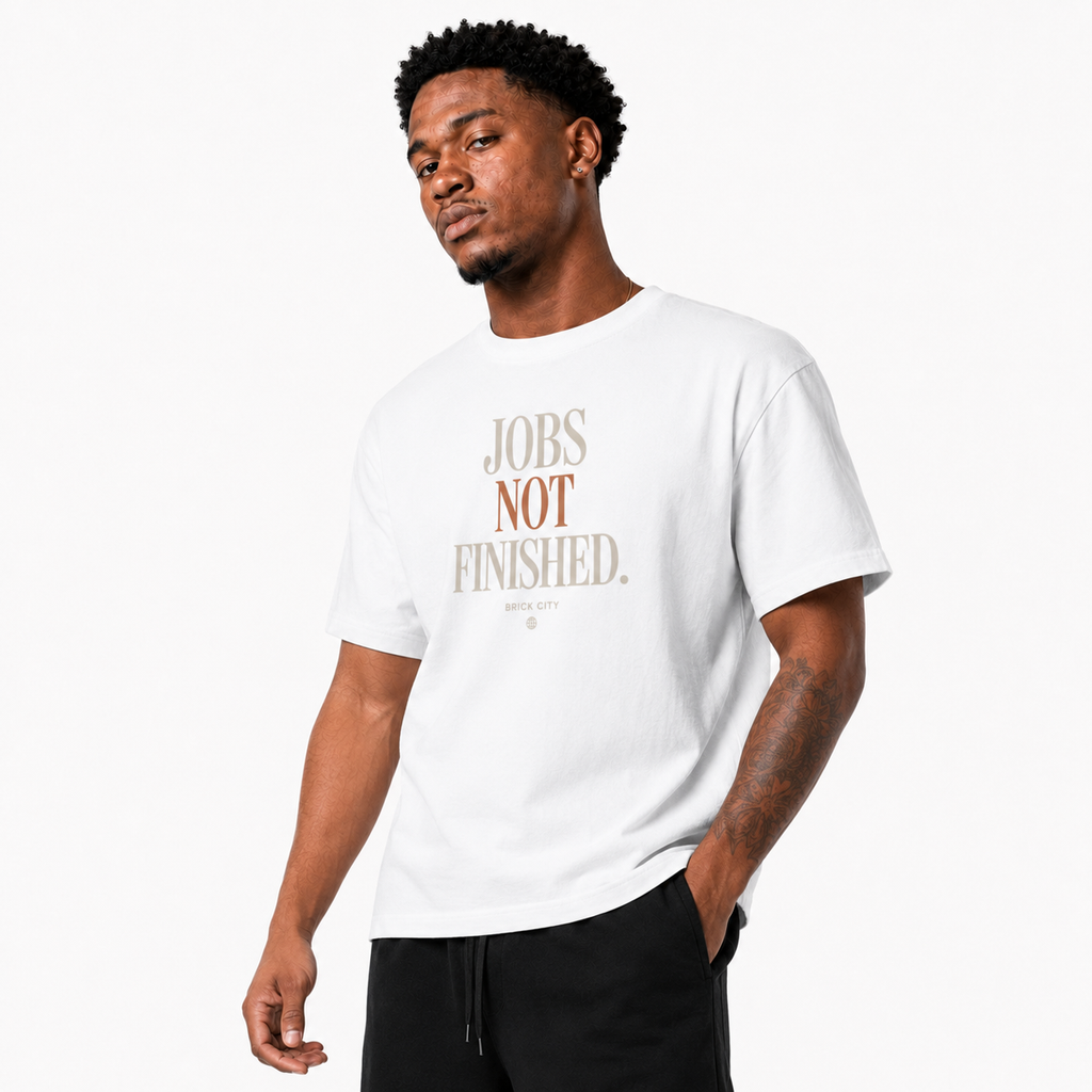 Jobs Not Finished T-Shirt on Brick City model in studio view three