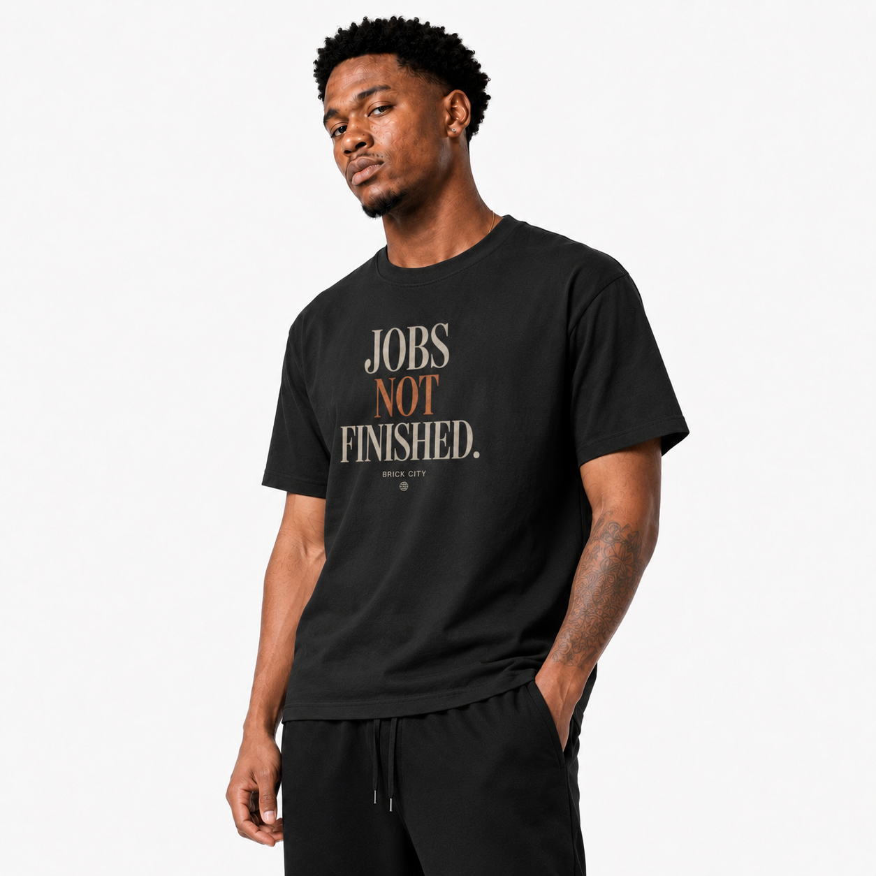 Jobs Not Finished T-Shirt on Brick City model in studio view five