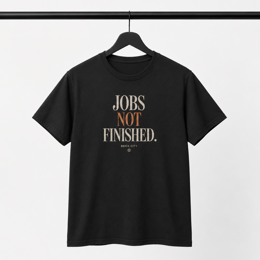 Jobs Not Finished T-Shirt by Brick City on a studio product mockup