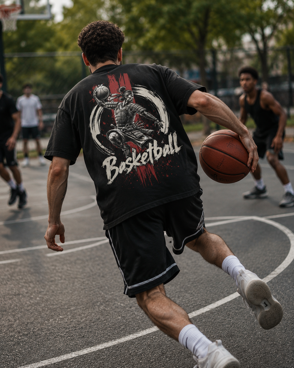 Kunai Basketball Tee worn in outdoor basketball court lifestyle mockup