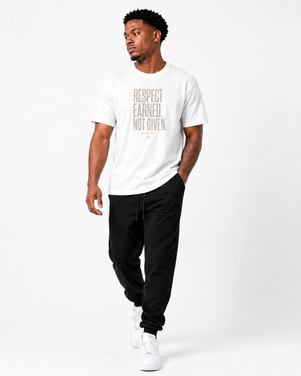 Respect Earned T-Shirt on Brick City model in studio view one