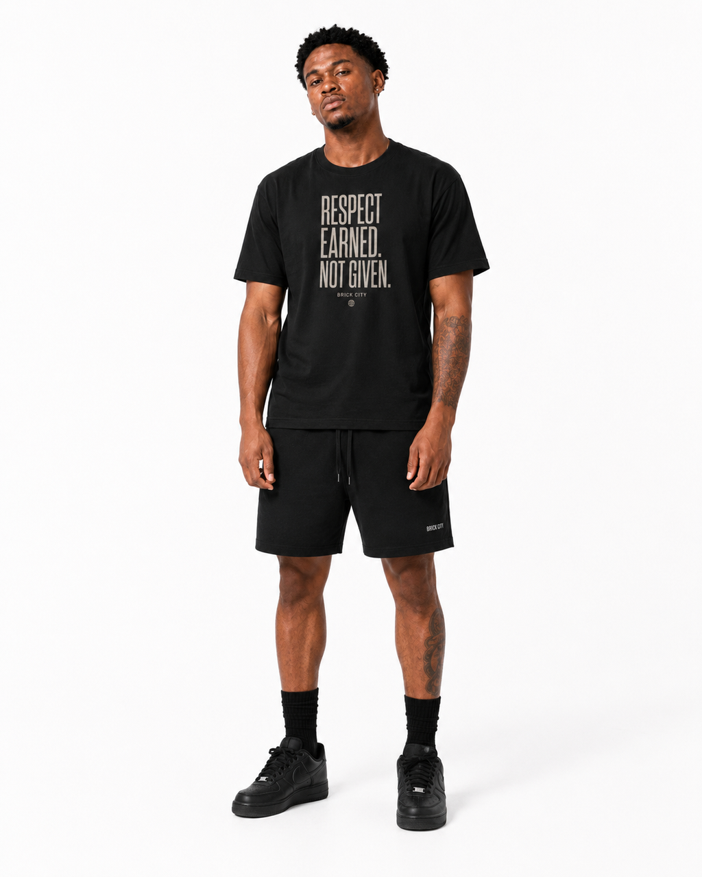 Respect Earned T-Shirt on Brick City model in studio view four