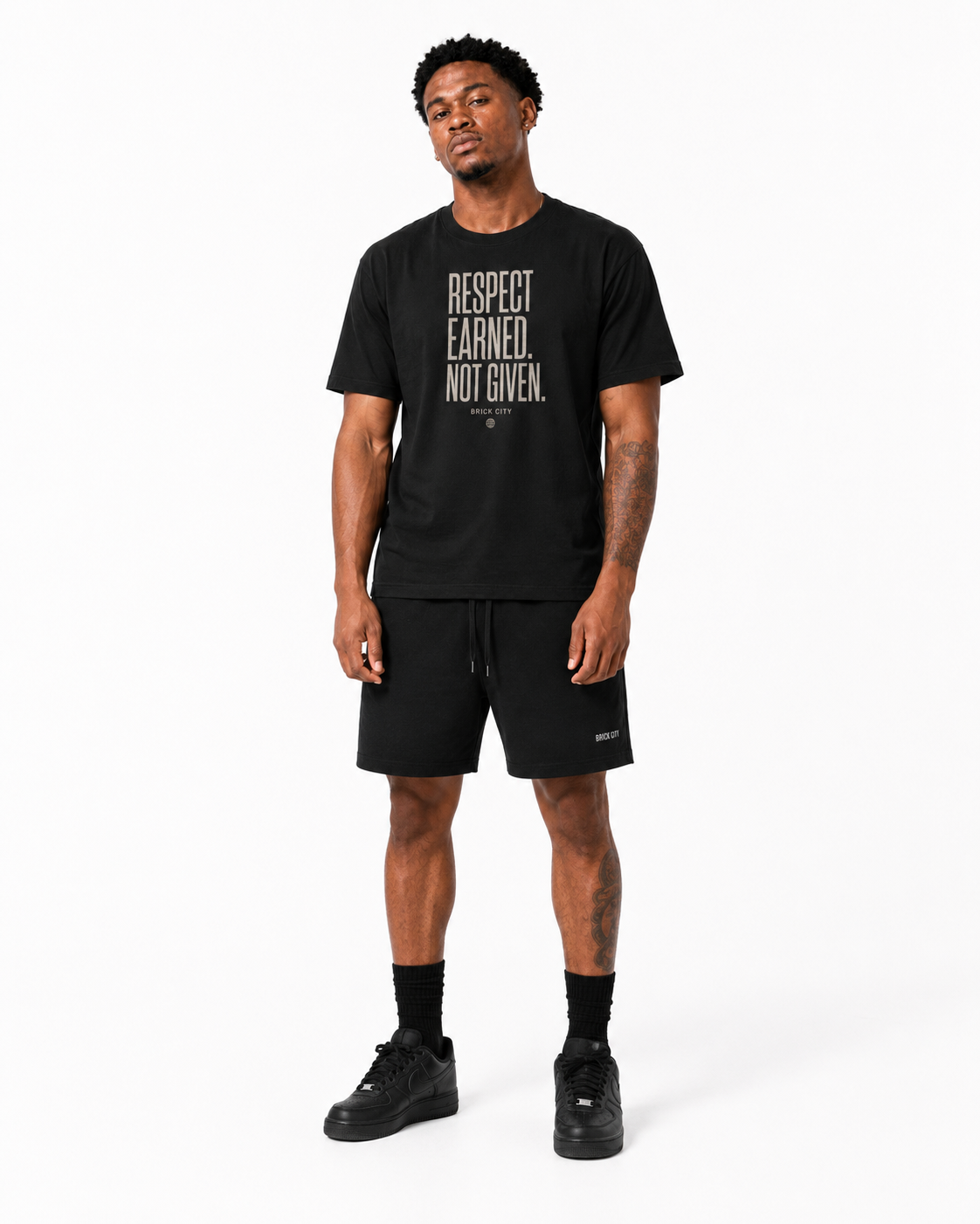 Respect Earned T-Shirt on Brick City model in studio view four