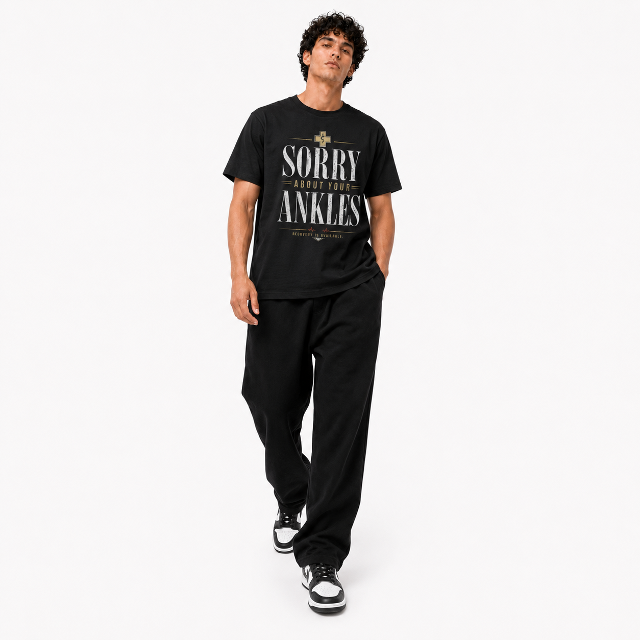 Sorry About Your Ankles black T-shirt walking pose on Brick City model