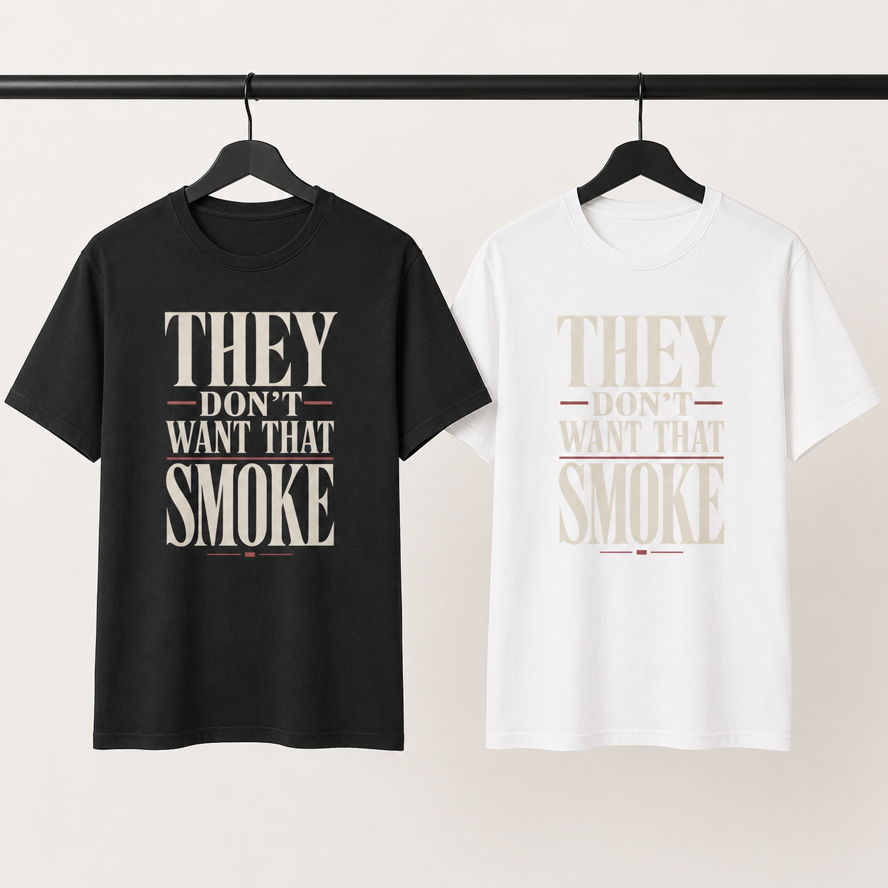 They Don’t Want That Smoke T-Shirt in black and white on a studio clothing rail
