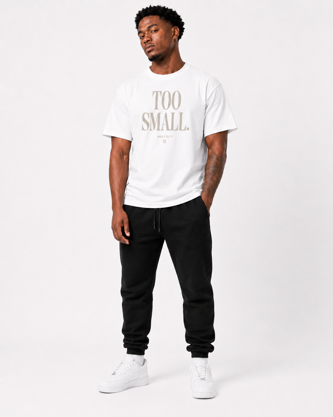 Too Small T-Shirt on Brick City model in studio view three