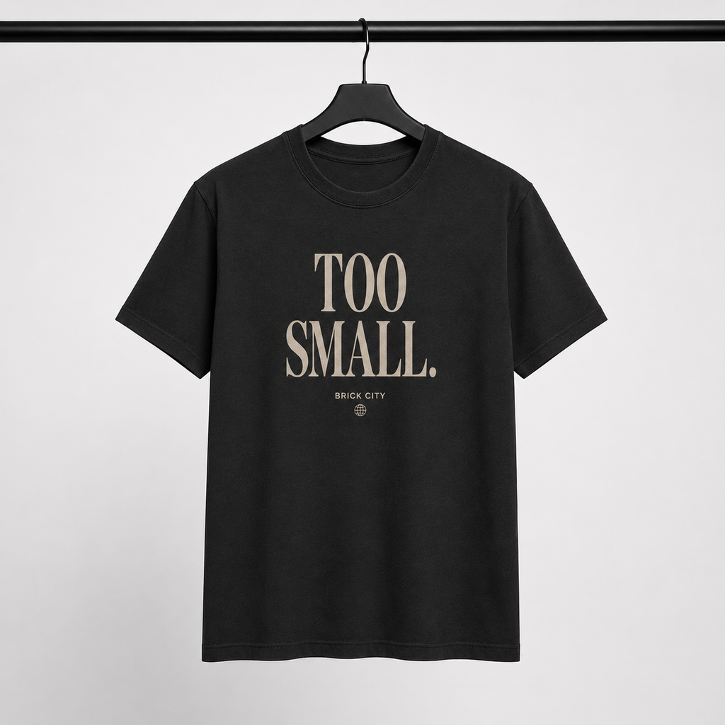 Too Small T-Shirt by Brick City on a studio product image